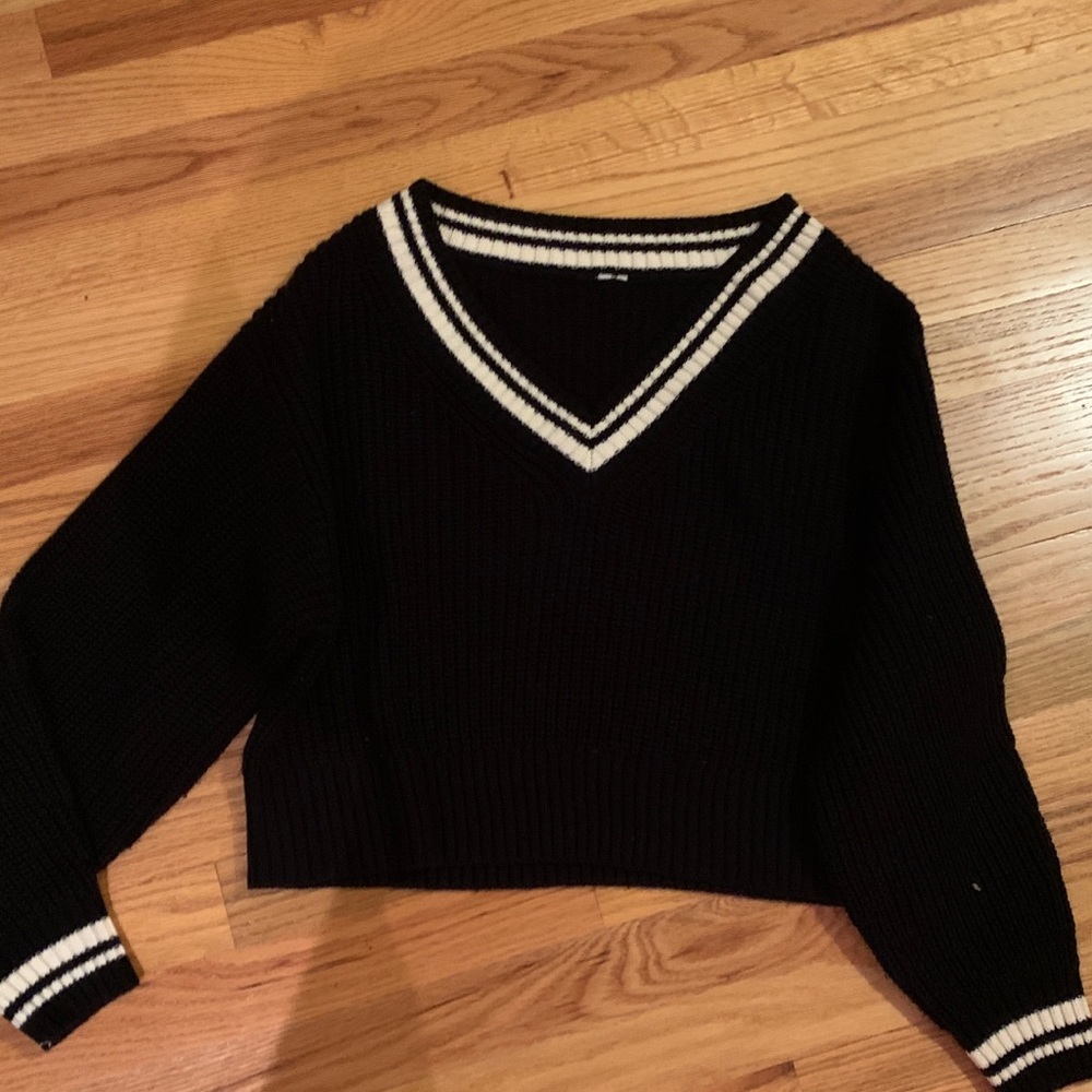 cropped black and white sweater